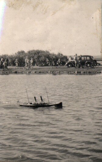 19500000s G S LONG Drake + GSL's car beyond Poole Park fresh water lake 1